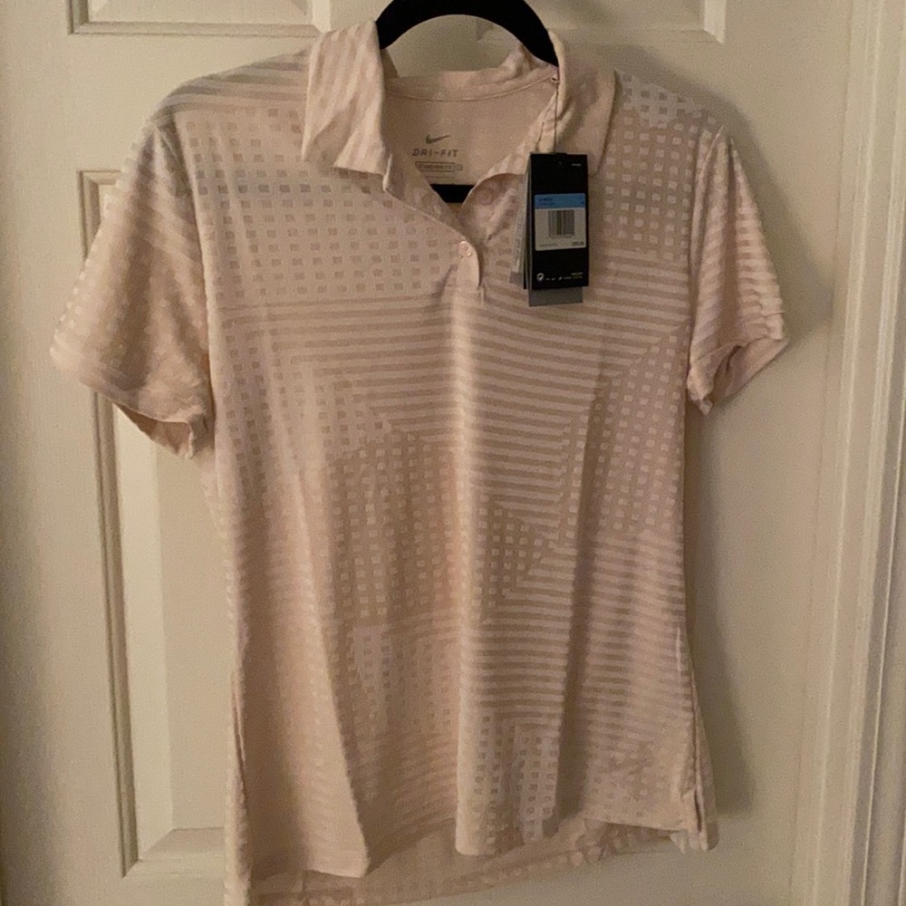 Nike golf shirt.
